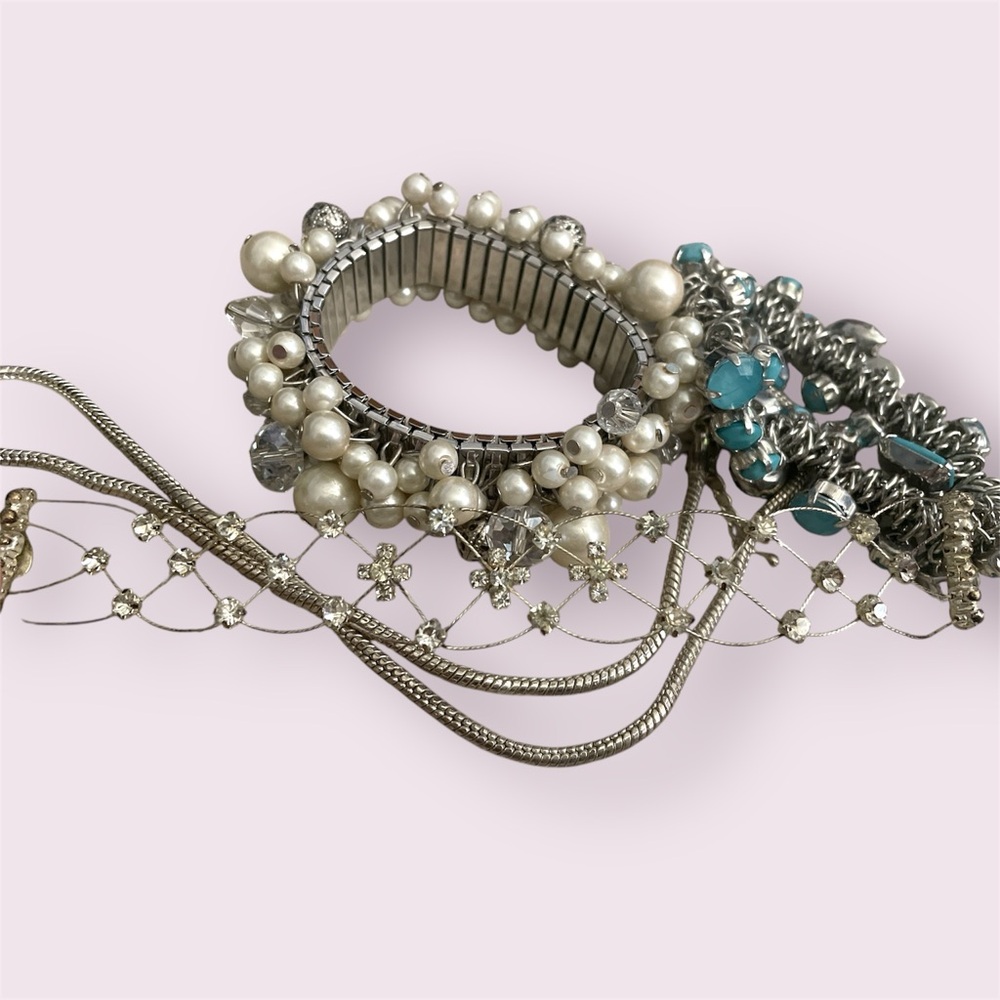 Bracelets and silver chain necklace